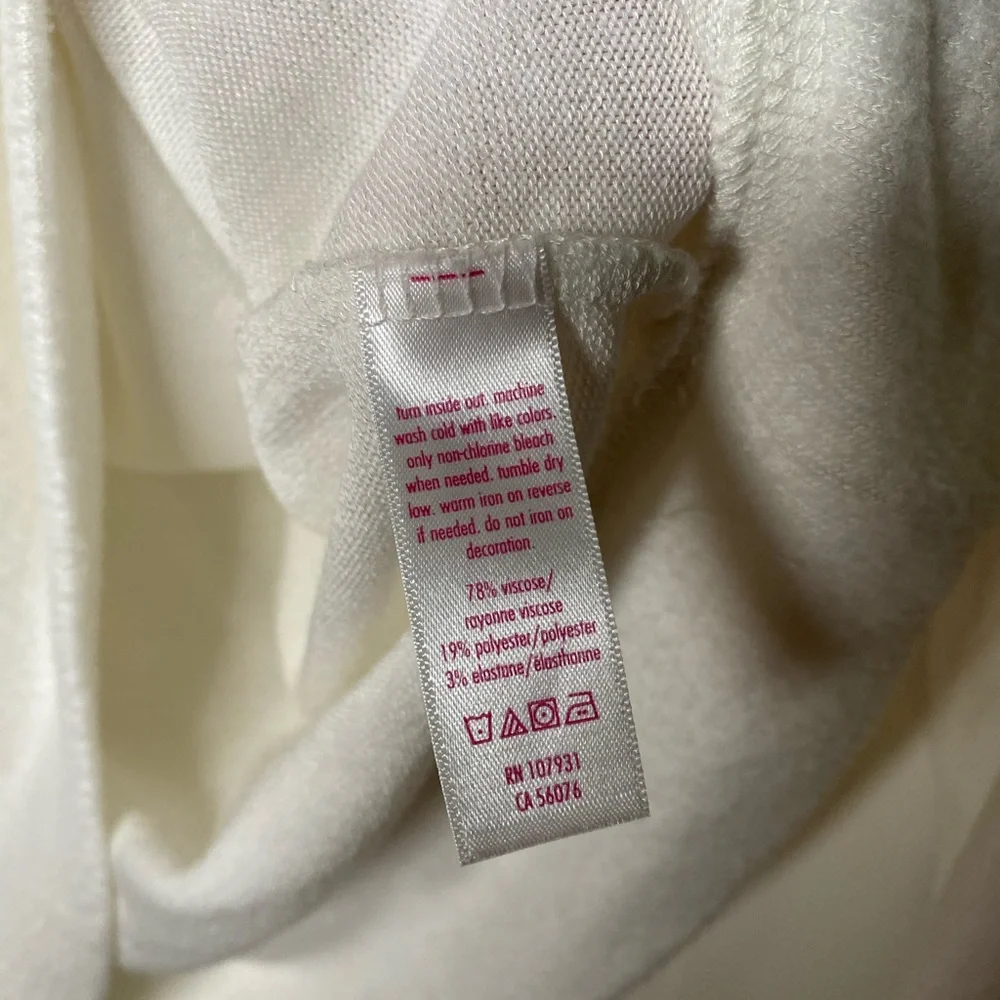Justice “believe the hype” white fuzzy sweater